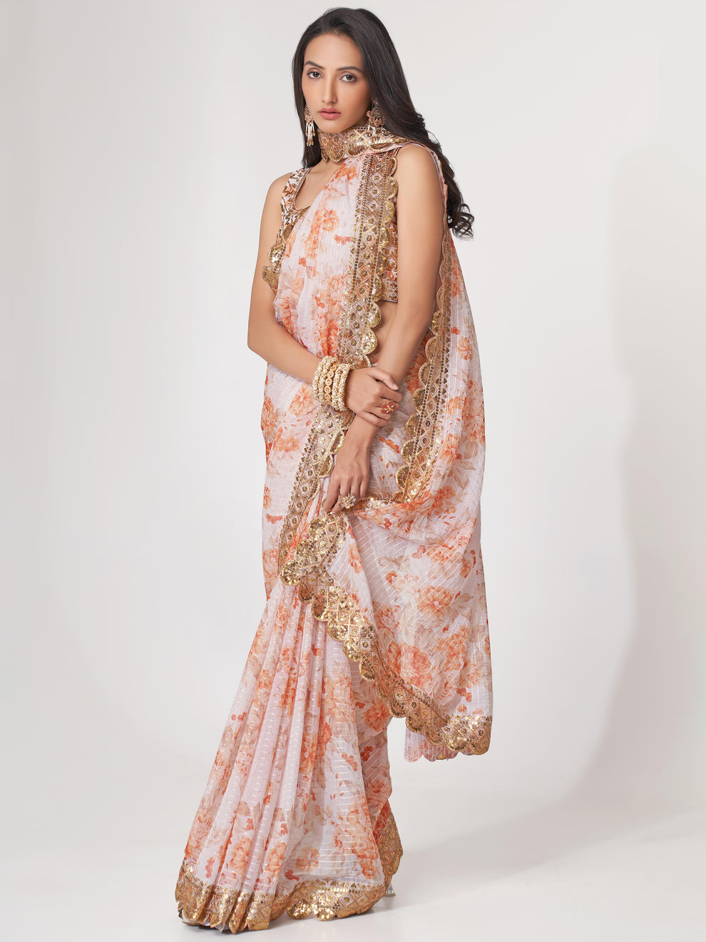 White Saree stands for purity and class – ideal for serene and sacred events.
