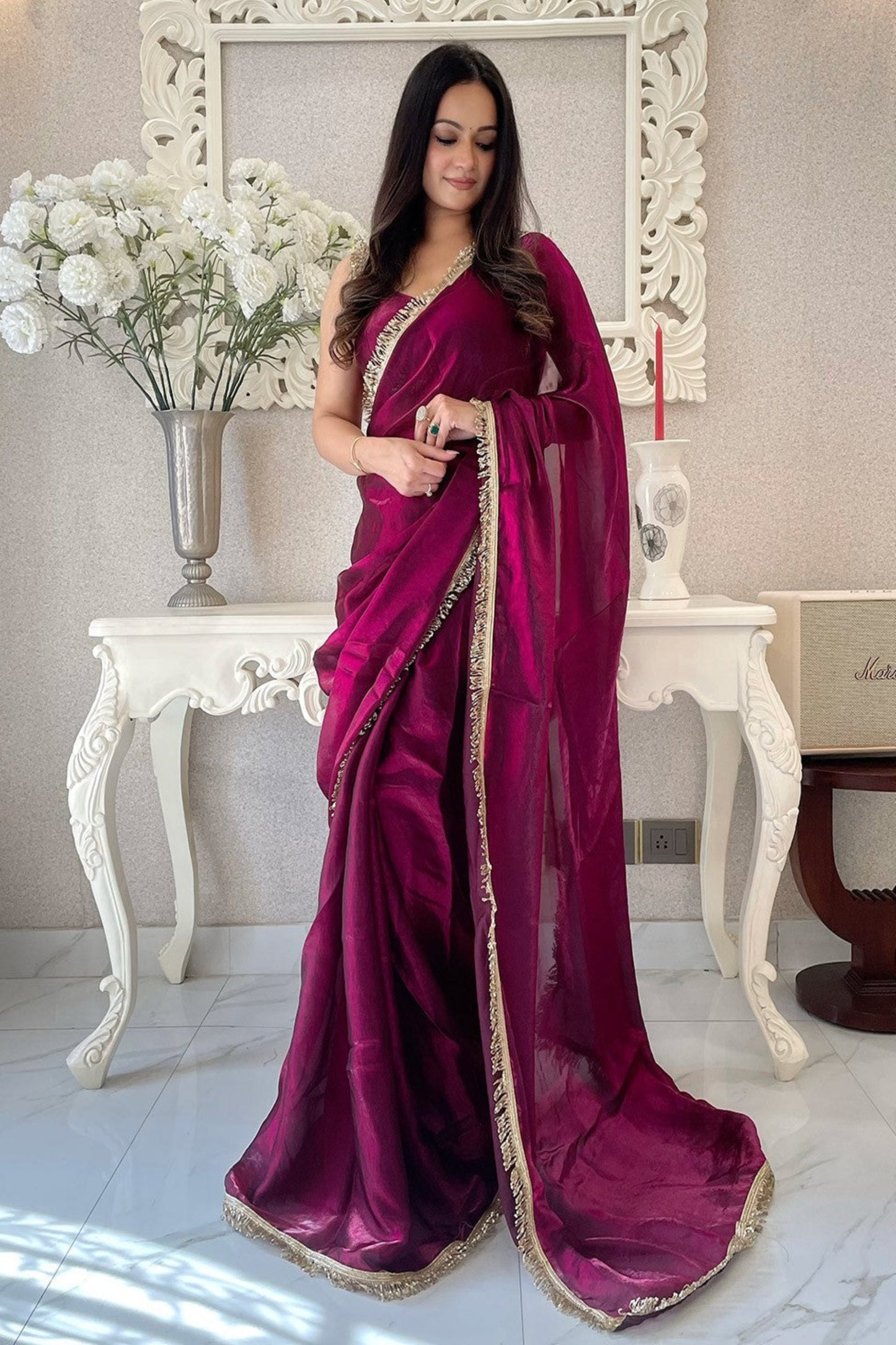 Wine Saree exudes rich sophistication – a bold yet graceful choice for any occasion.
