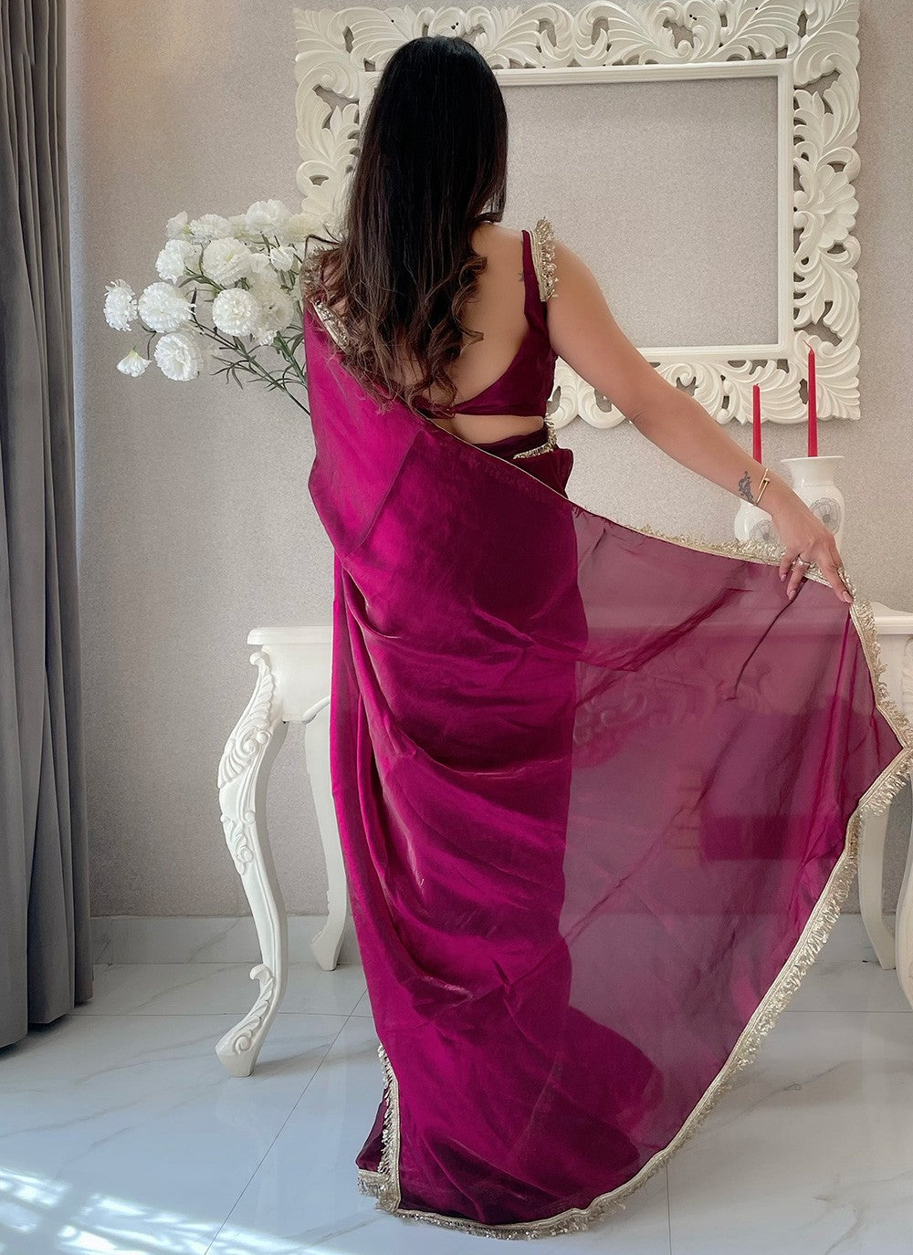 Wine Saree exudes rich sophistication – a bold yet graceful choice for any occasion.
