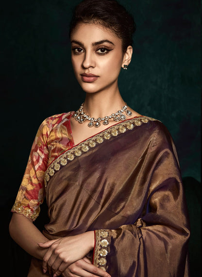 Brown Saree brings earthy elegance – ideal for intimate gatherings and cultural celebrations.
