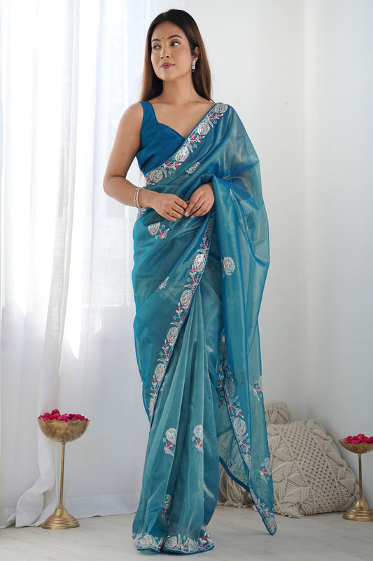 Stunning sky blue silk saree with embroidery for traditional wear.