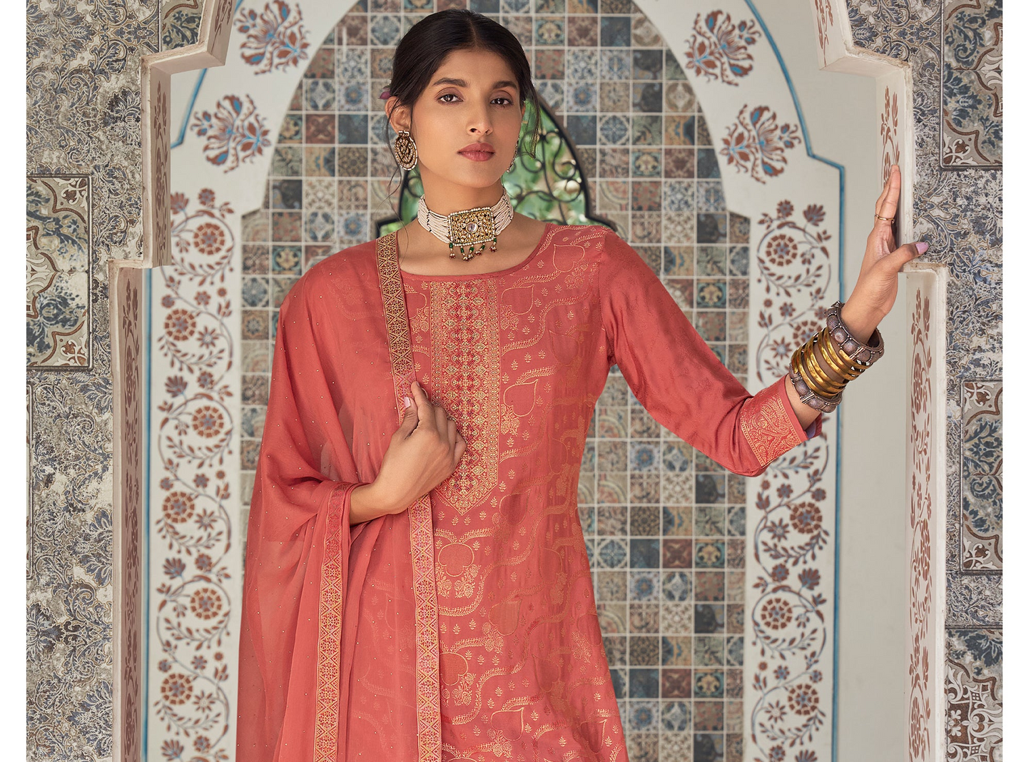 Pink suit salwar suit closeup view on model 