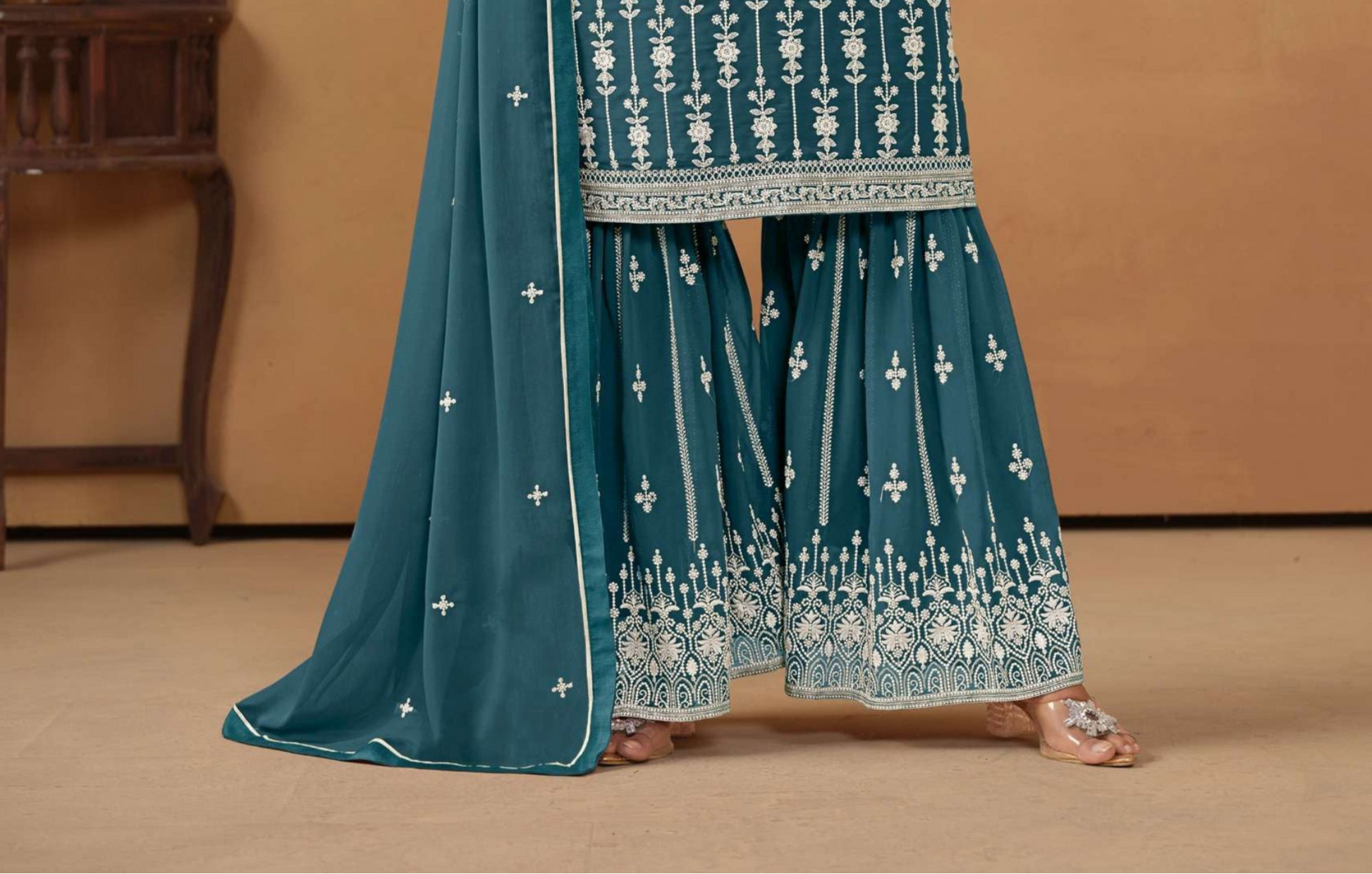 Close up of teal sharara suit embroidery detailing