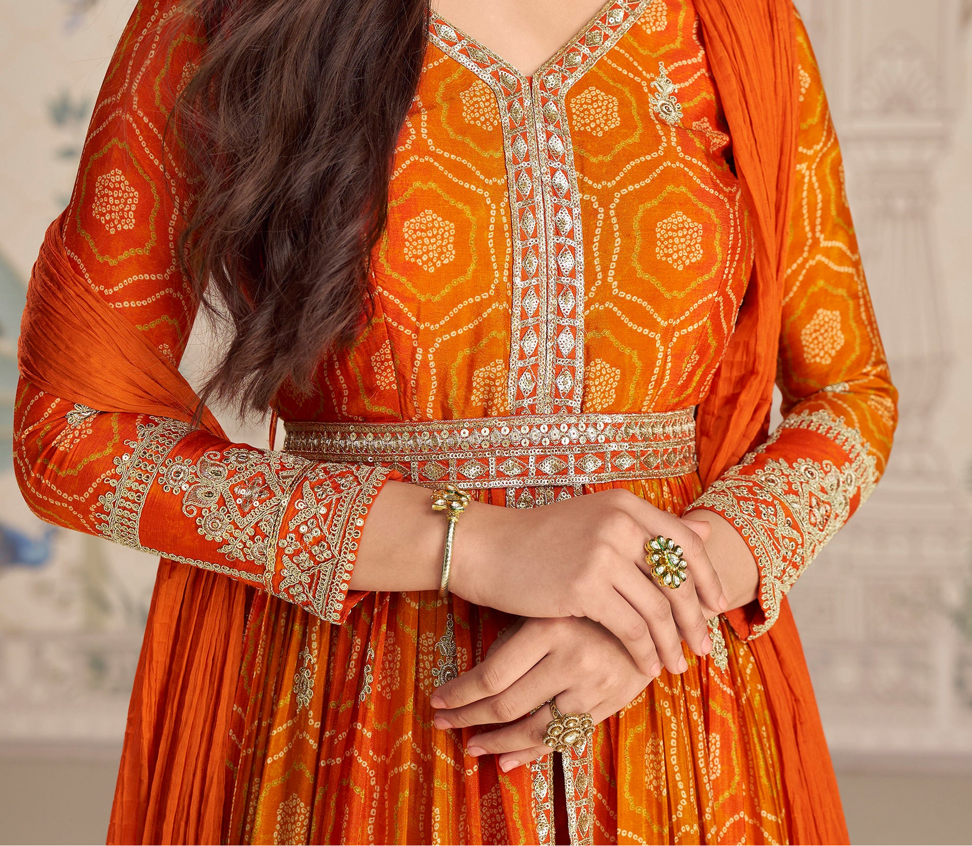 Embroidery detail on orange anarkali bodice