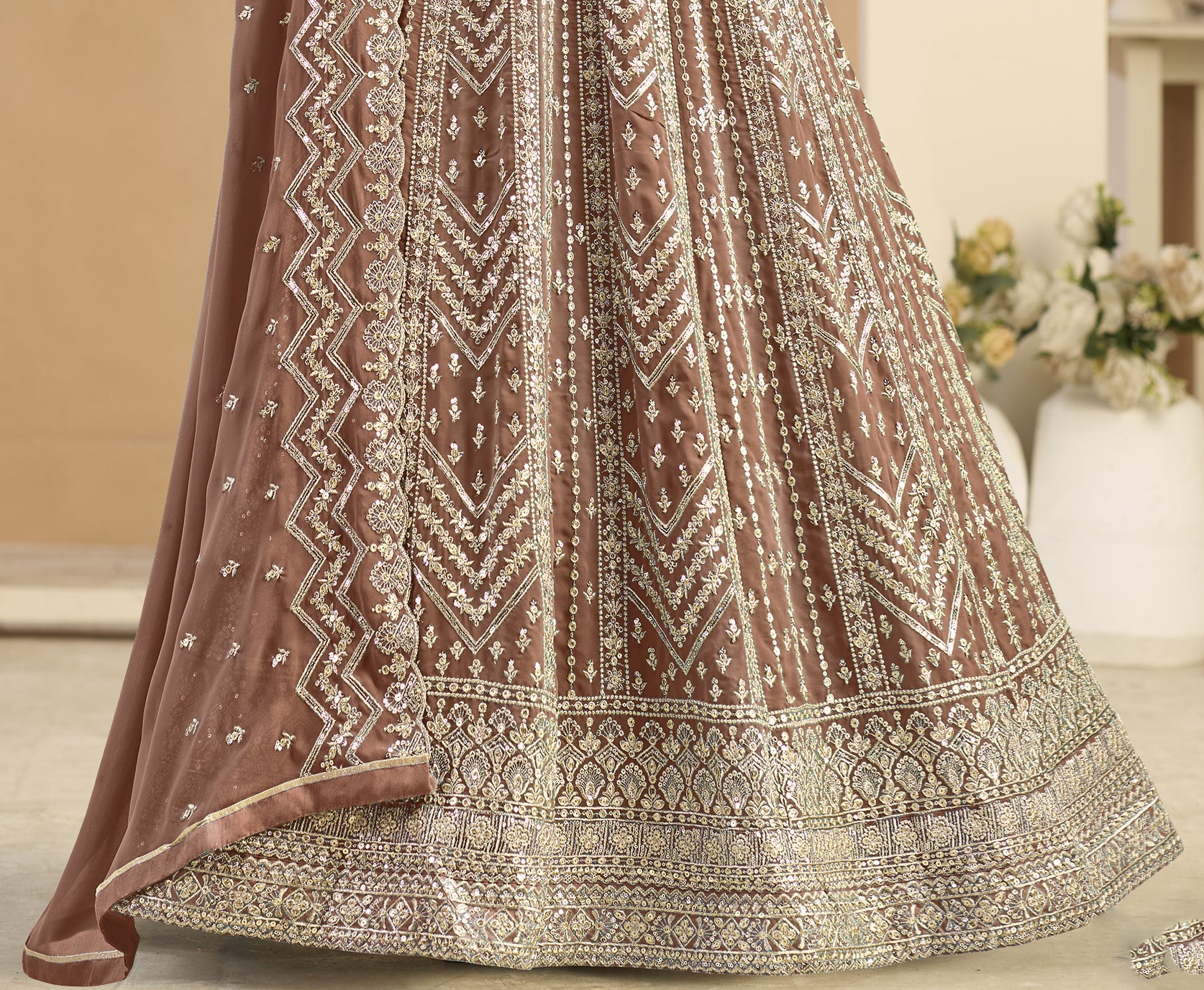 Light brown Anarkali gown hem detail