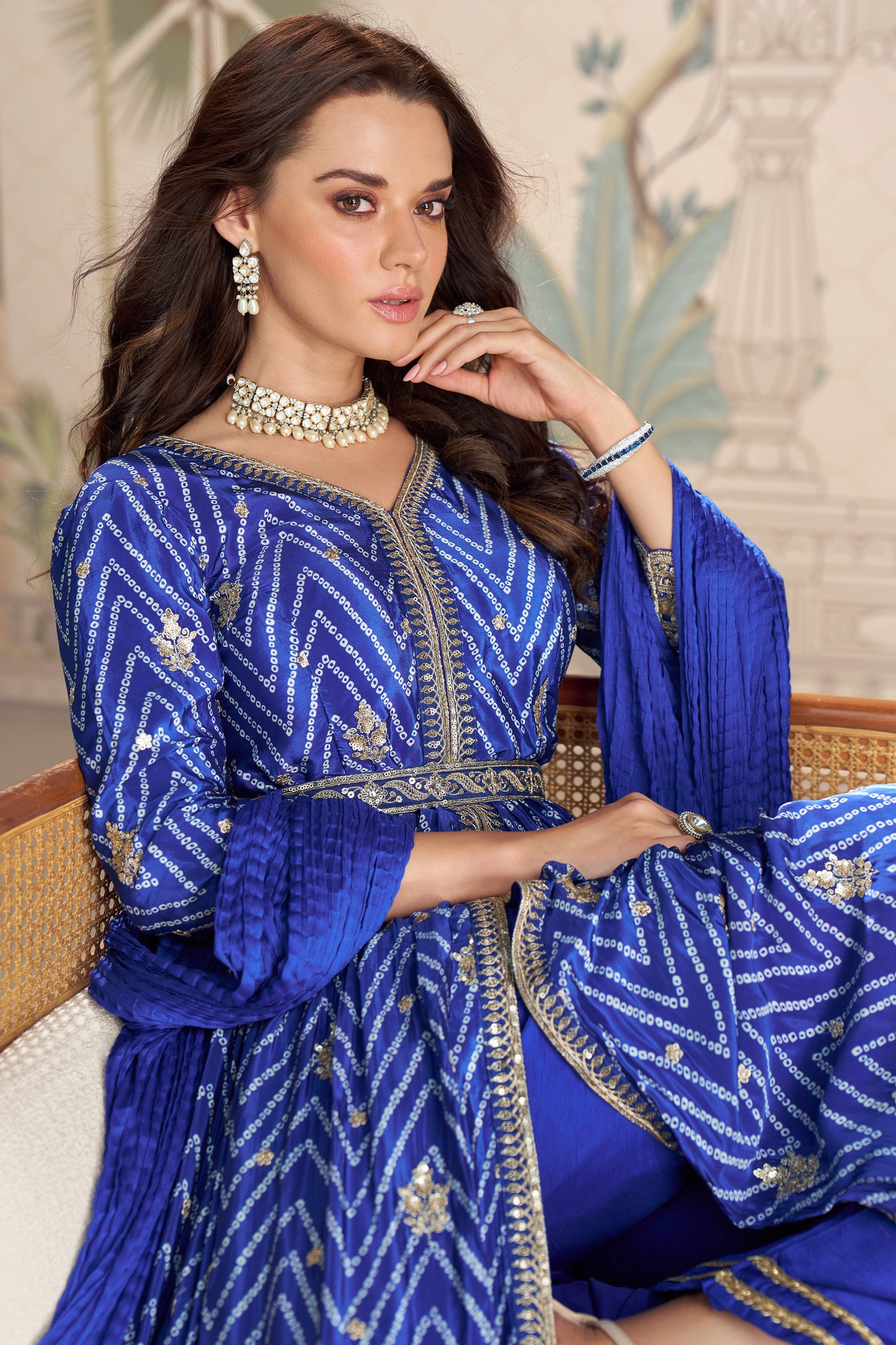 Close up of embroidery work on blue anarkali