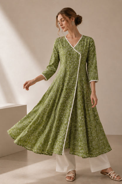 Woman wearing Green Anarkali Kurti with Floral Embroidered detailing