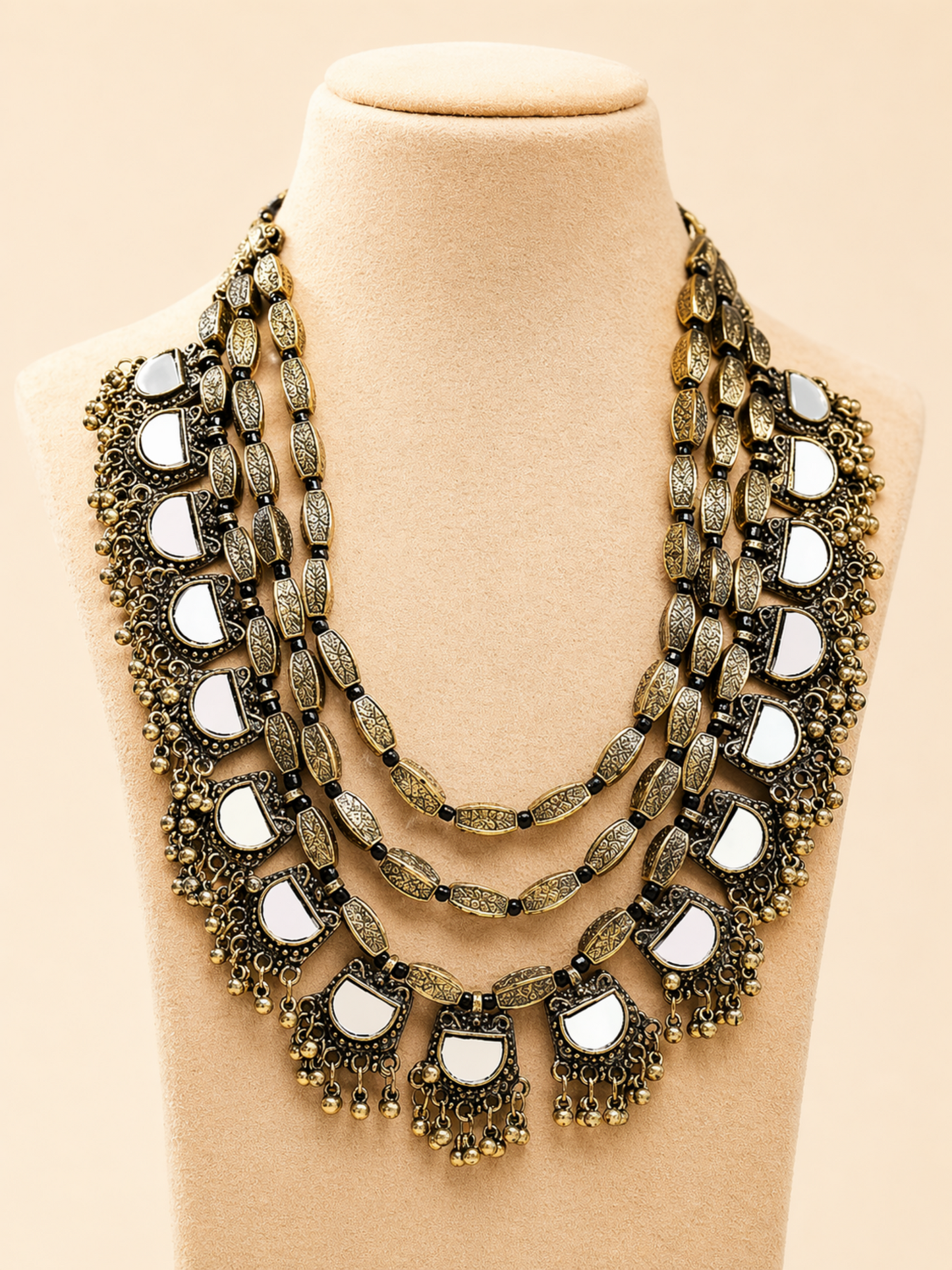 traditional necklace worn on model
