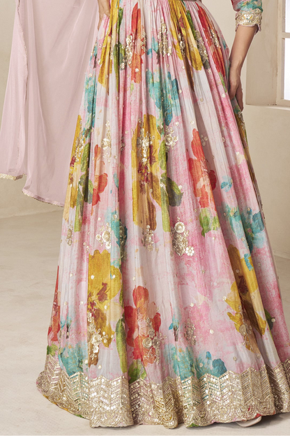 Flared silhouette of baby pink anarkali gown for festive events
