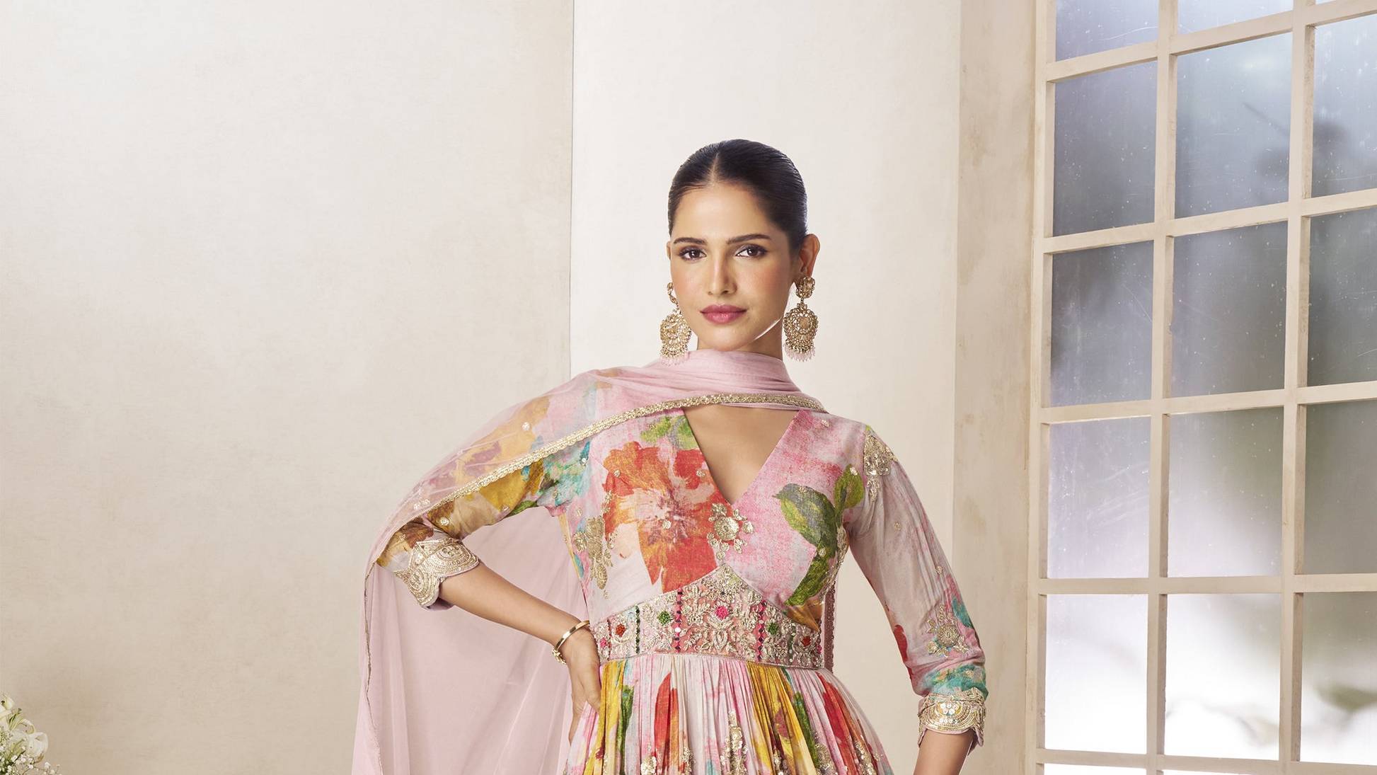 Soft baby pink anarkali dress styled for evening celebration