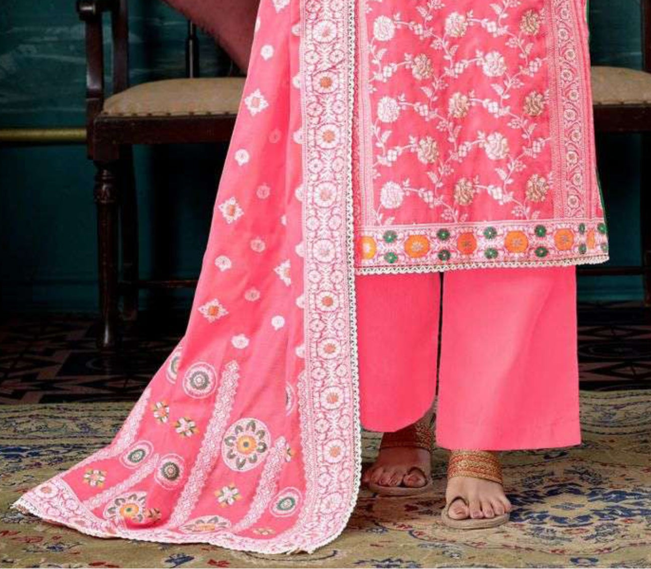 Women’s light pink cotton outfit for casual and festive occasions.