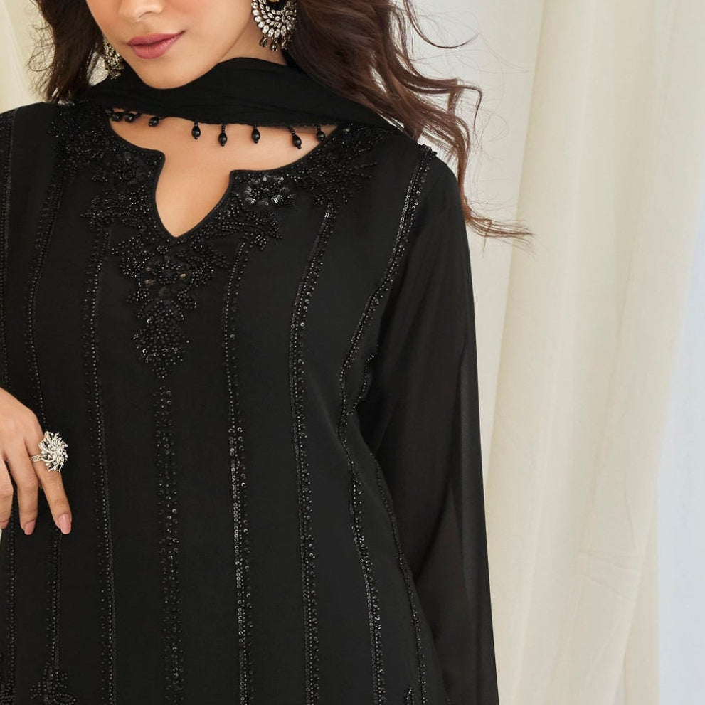 Neckline bead work detail on black kameez