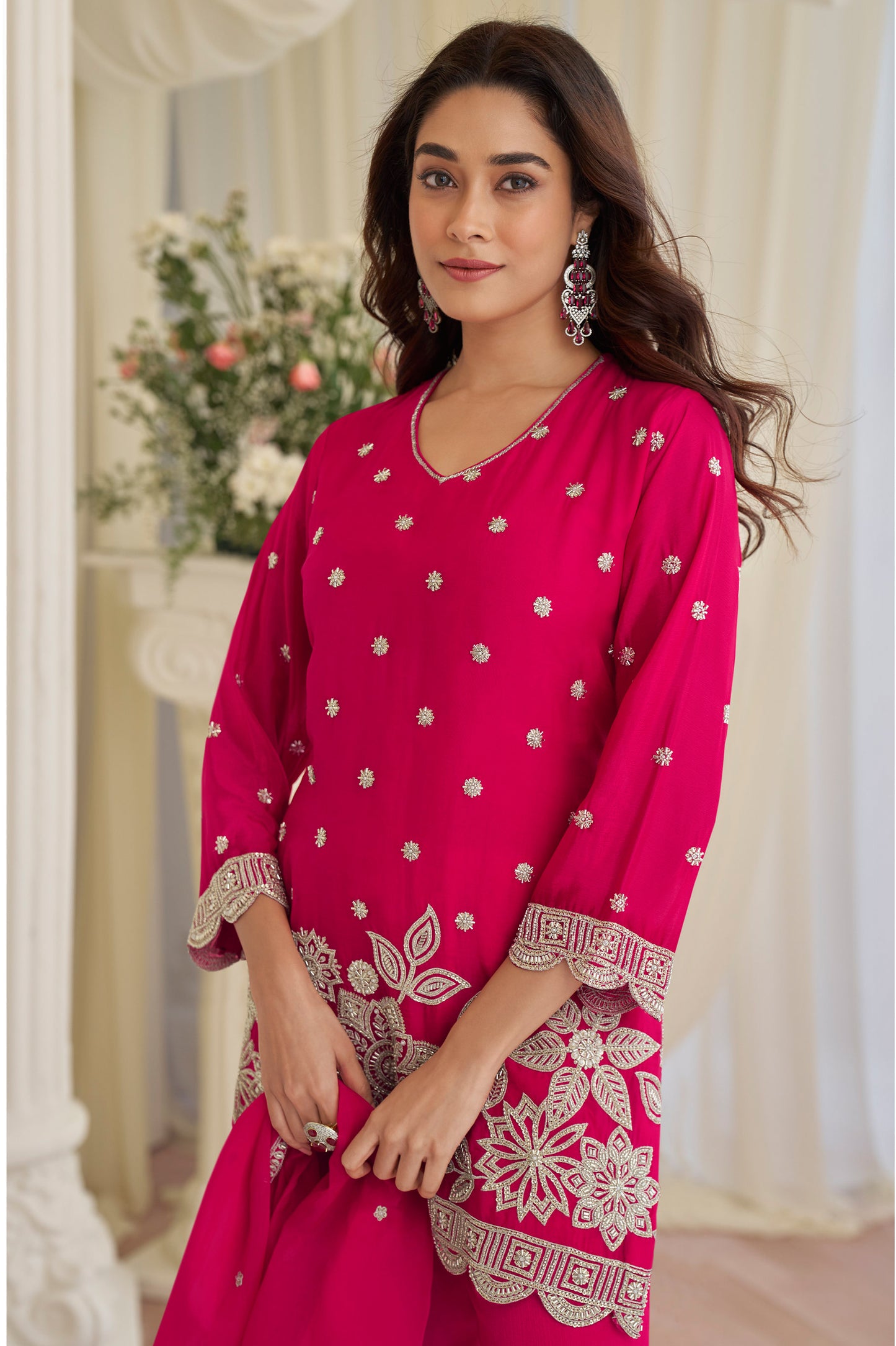 Close-up of beads embroidered work on pink kameez