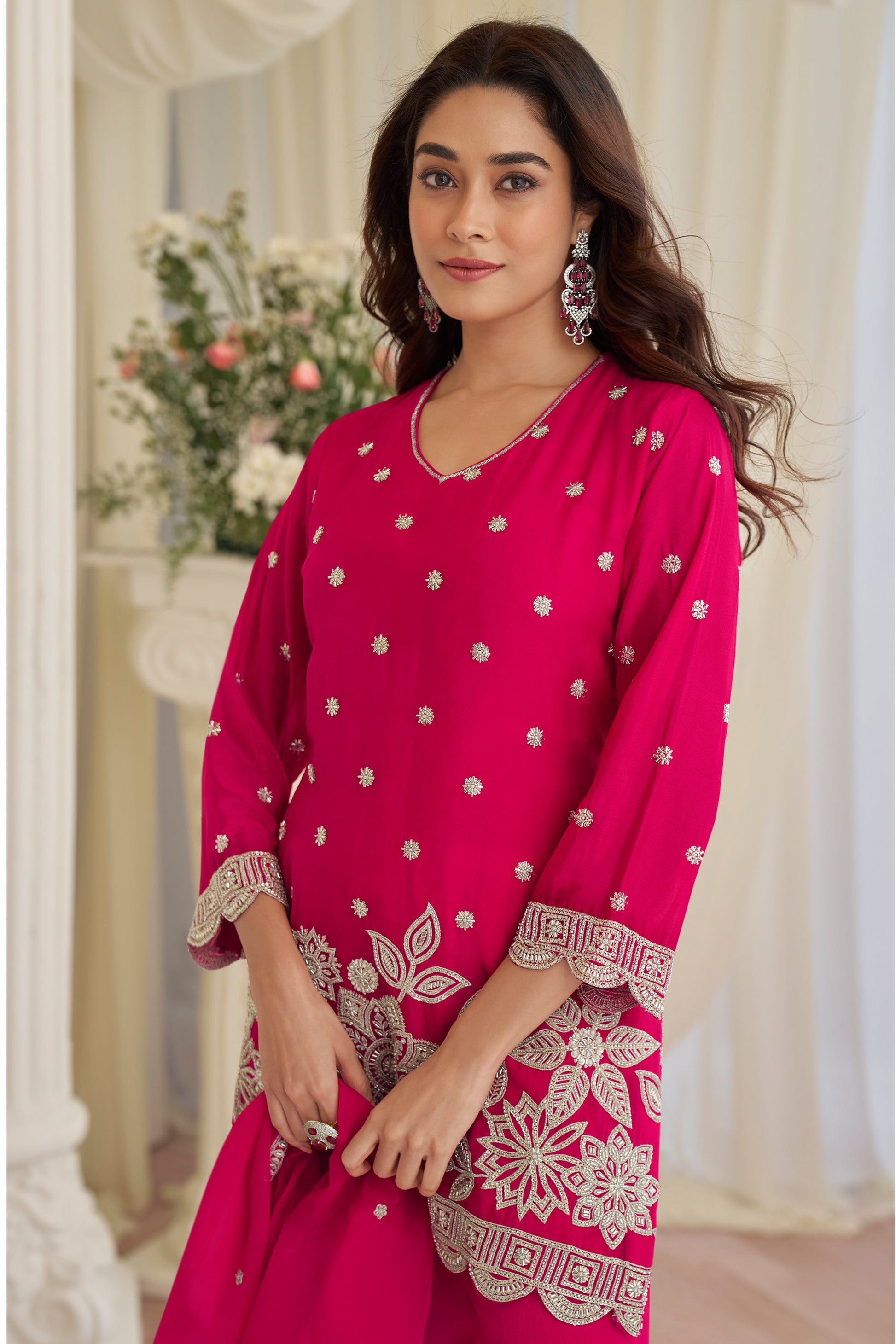 Close-up of beads embroidered work on pink kameez