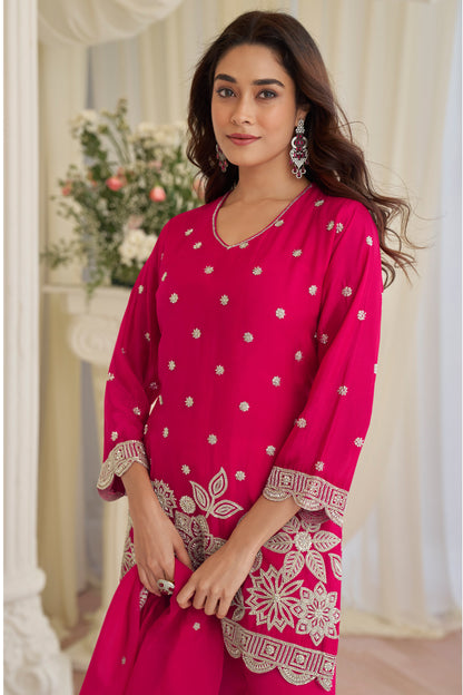 Close-up of beads embroidered work on pink kameez