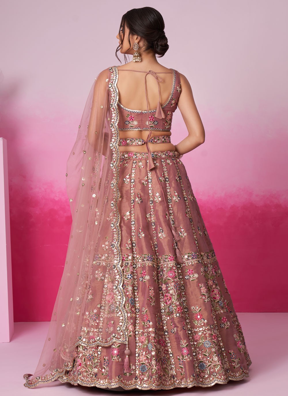 blush pink lehenga back view with dupatta drape
