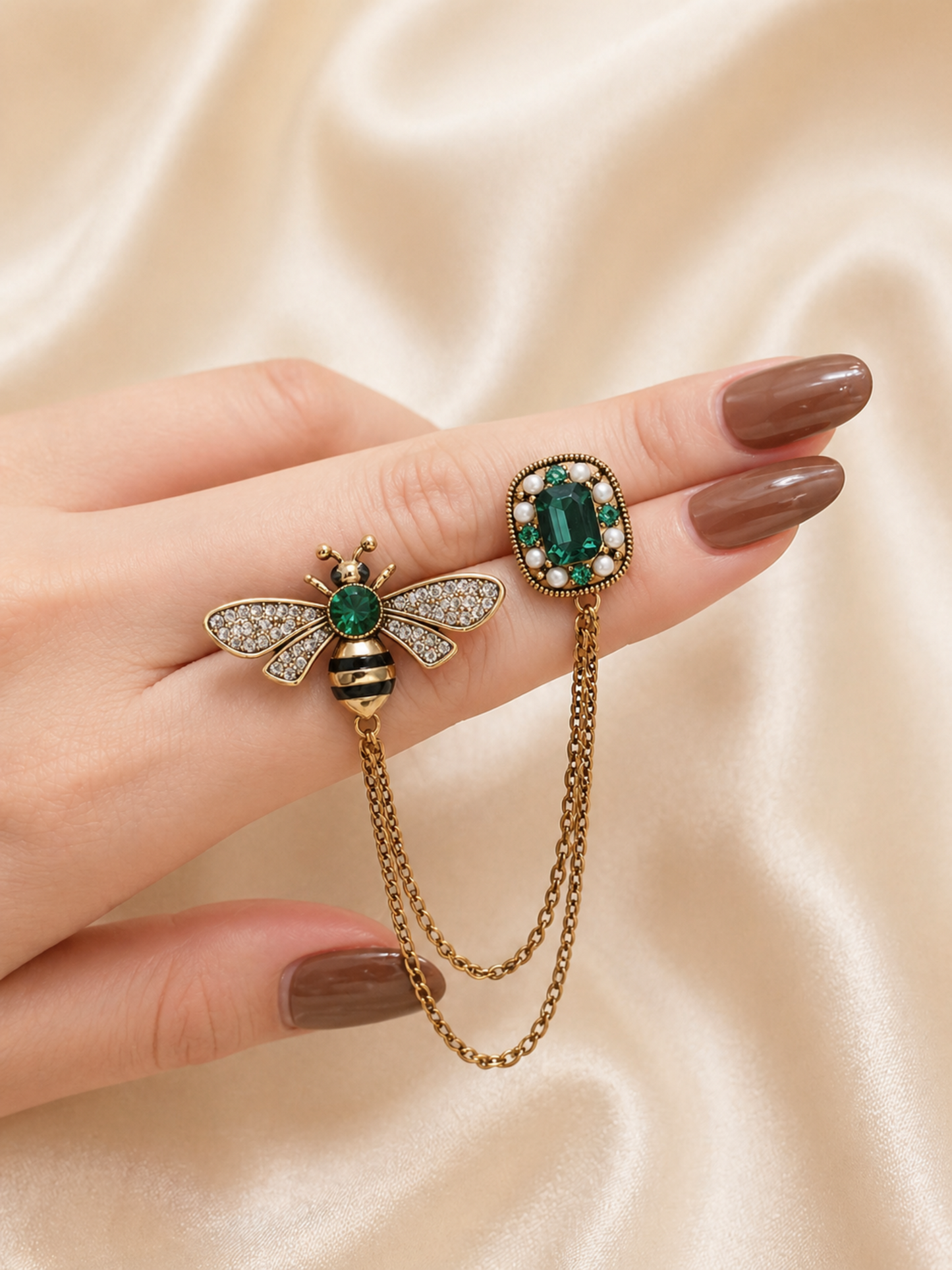 detailed wing brooch with polished finish