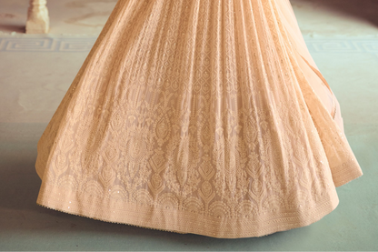 Hem detail of beige anarkali with wide flare