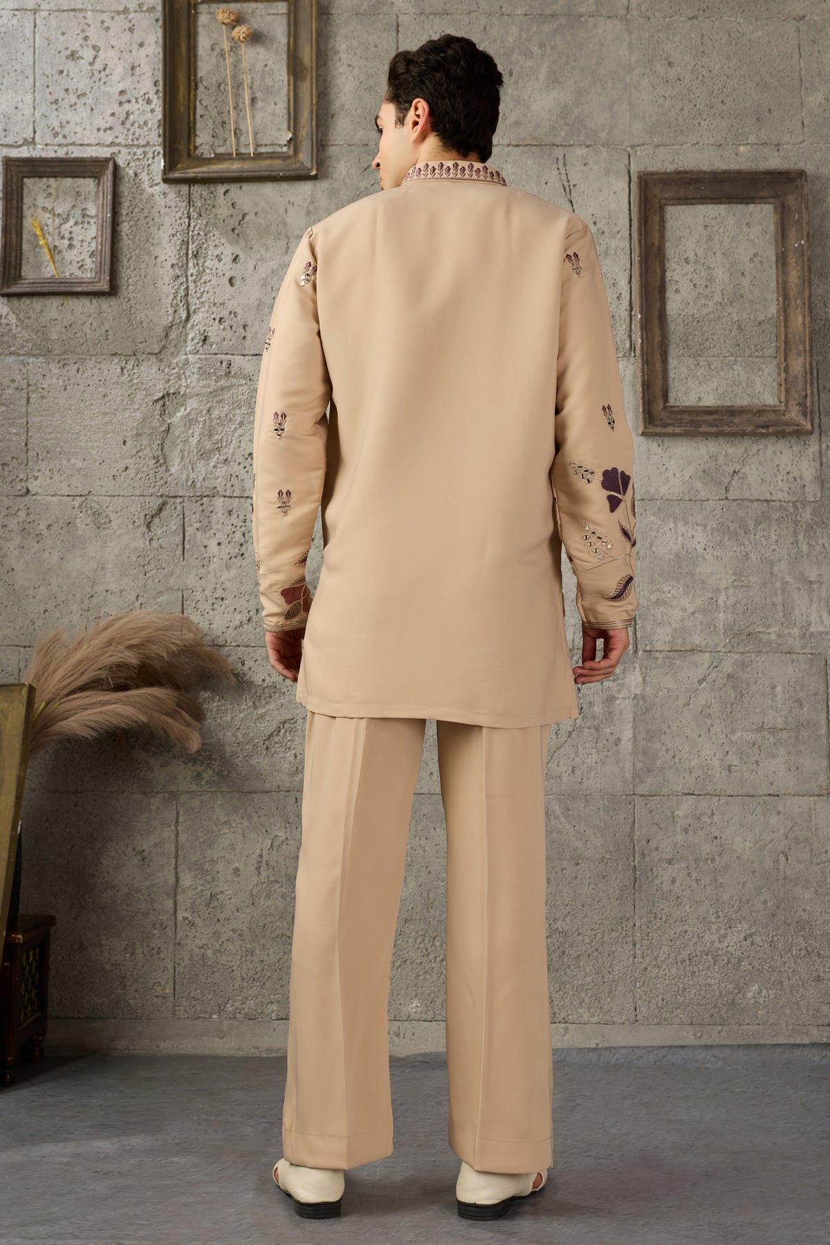 Back view of the beige kurta pajama set