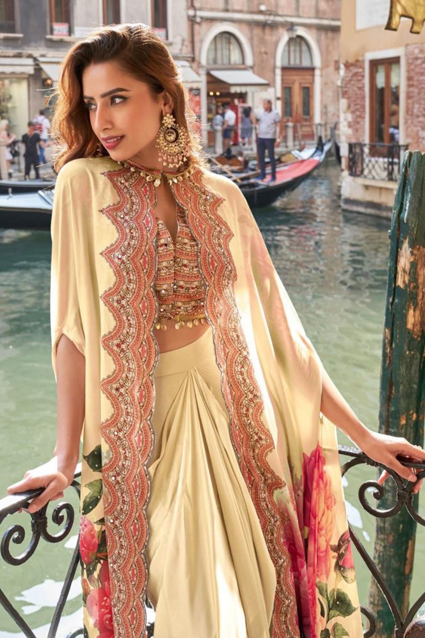 Hand work detail on beige jacket close view
