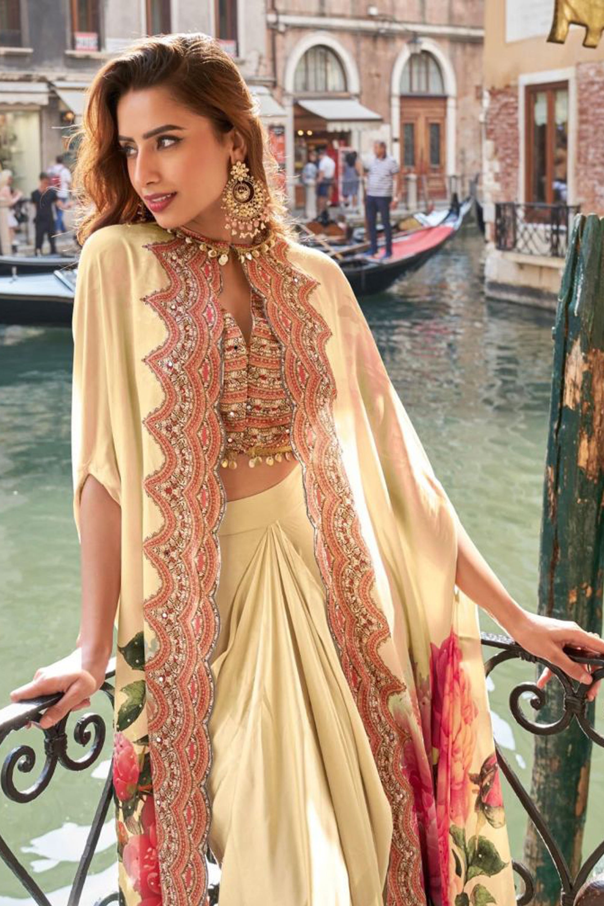Hand work detail on beige jacket close view