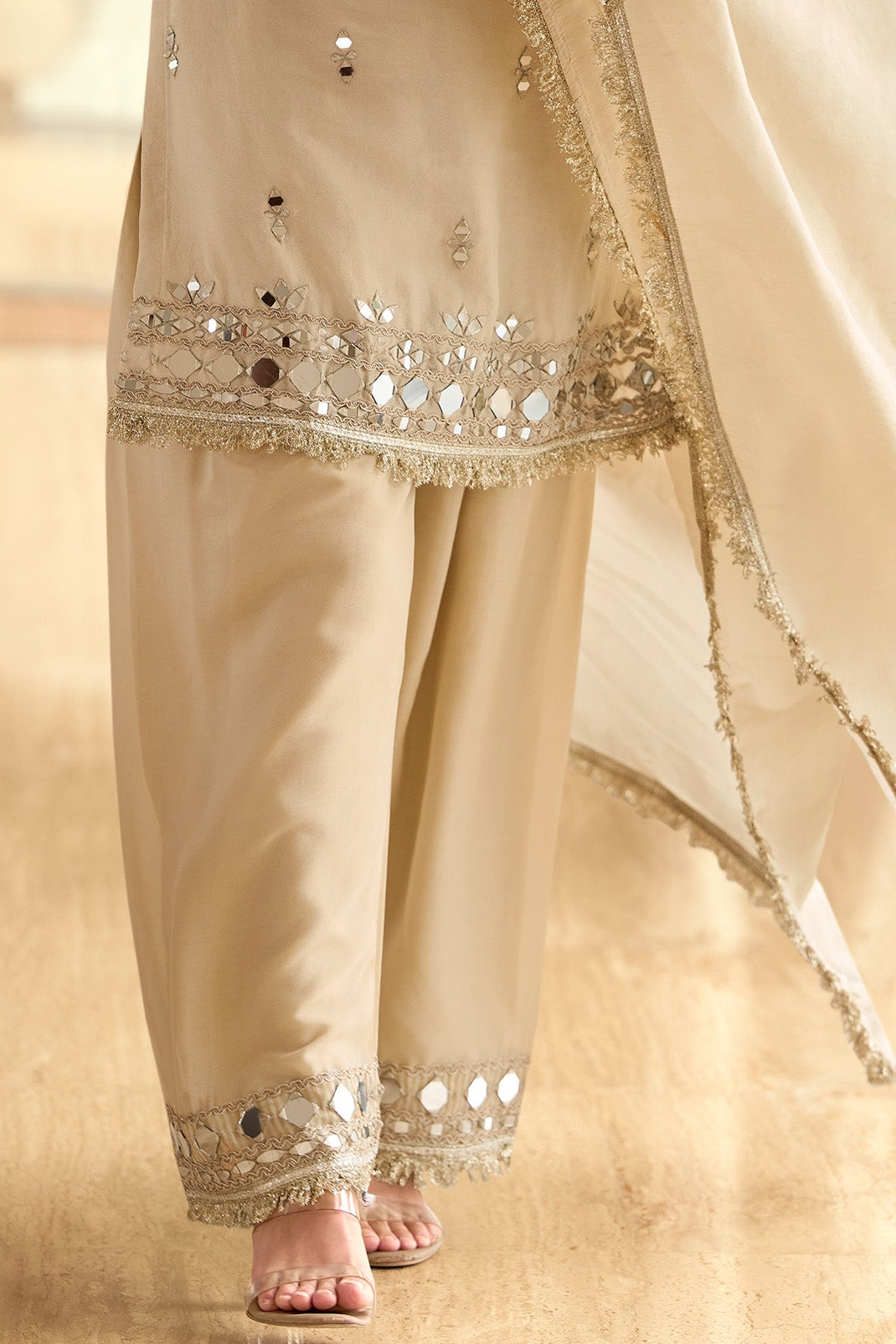 Close-up of beige palazzo pant design