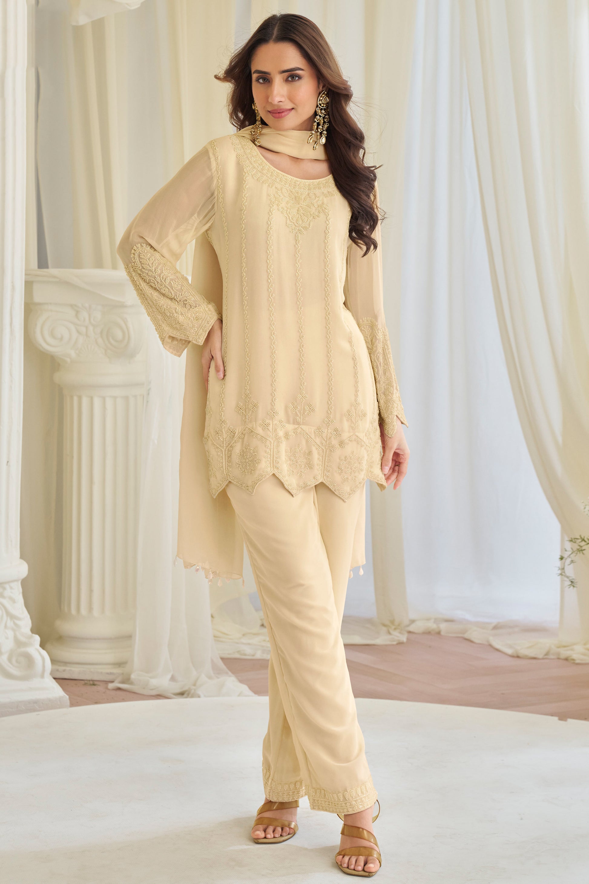 Beige salwar kameez front view with bead embroidery