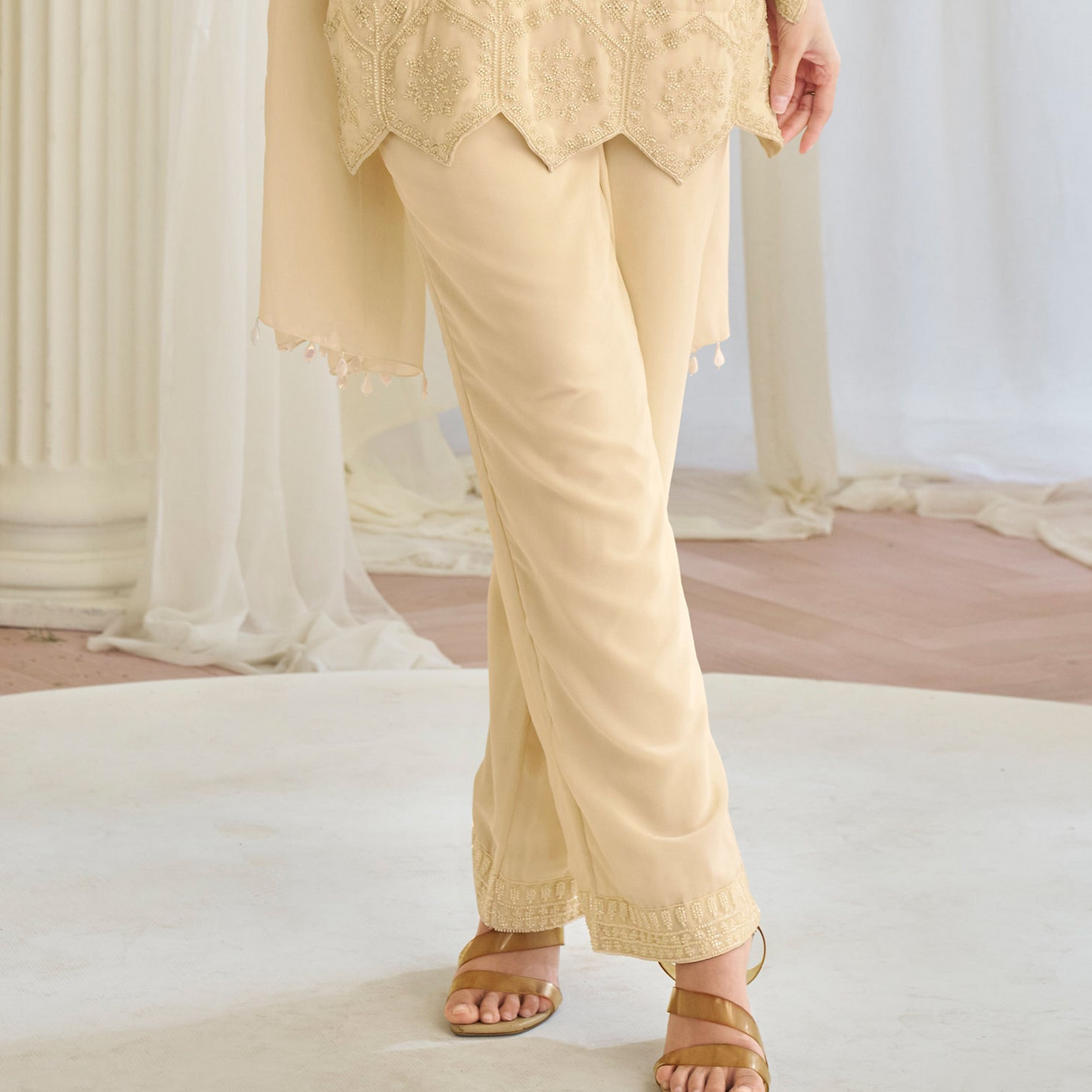 Beige ethnic suit styled for festive occasion