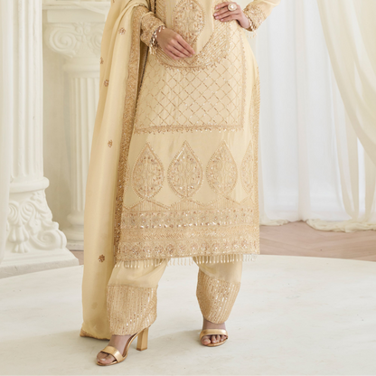 Flowing sharara pants detail in beige suit
