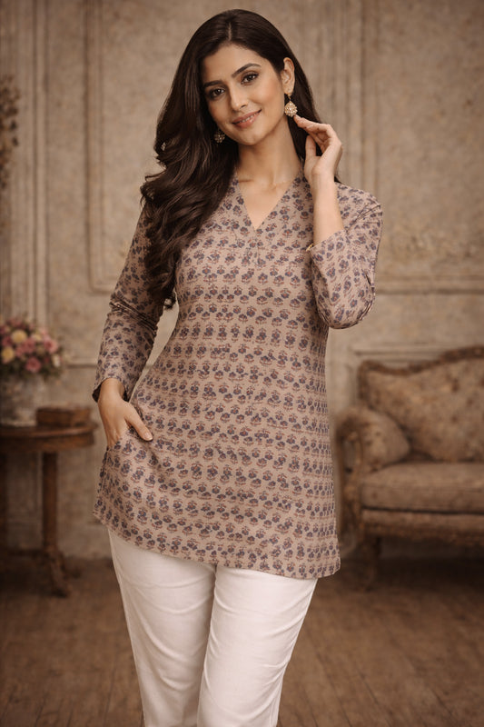 beige top styled with white pants for casual daytime look