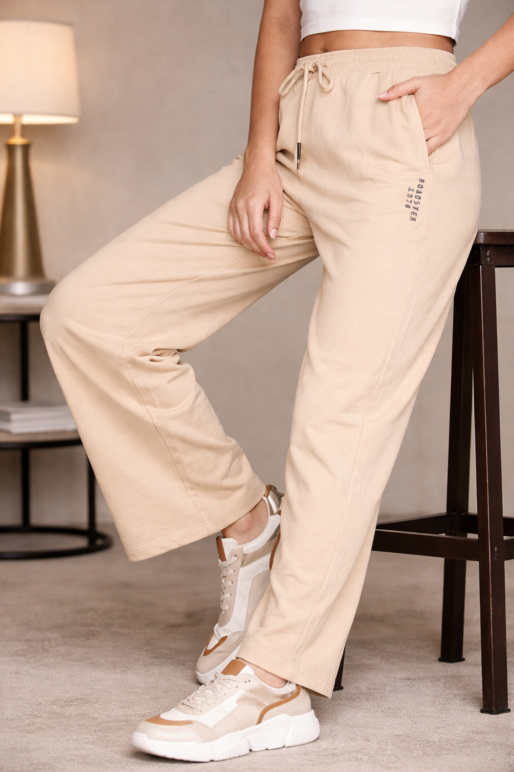 Formal styling with beige trouser pants