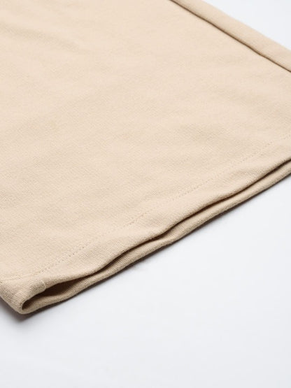 Relaxed city look with beige trouser pants