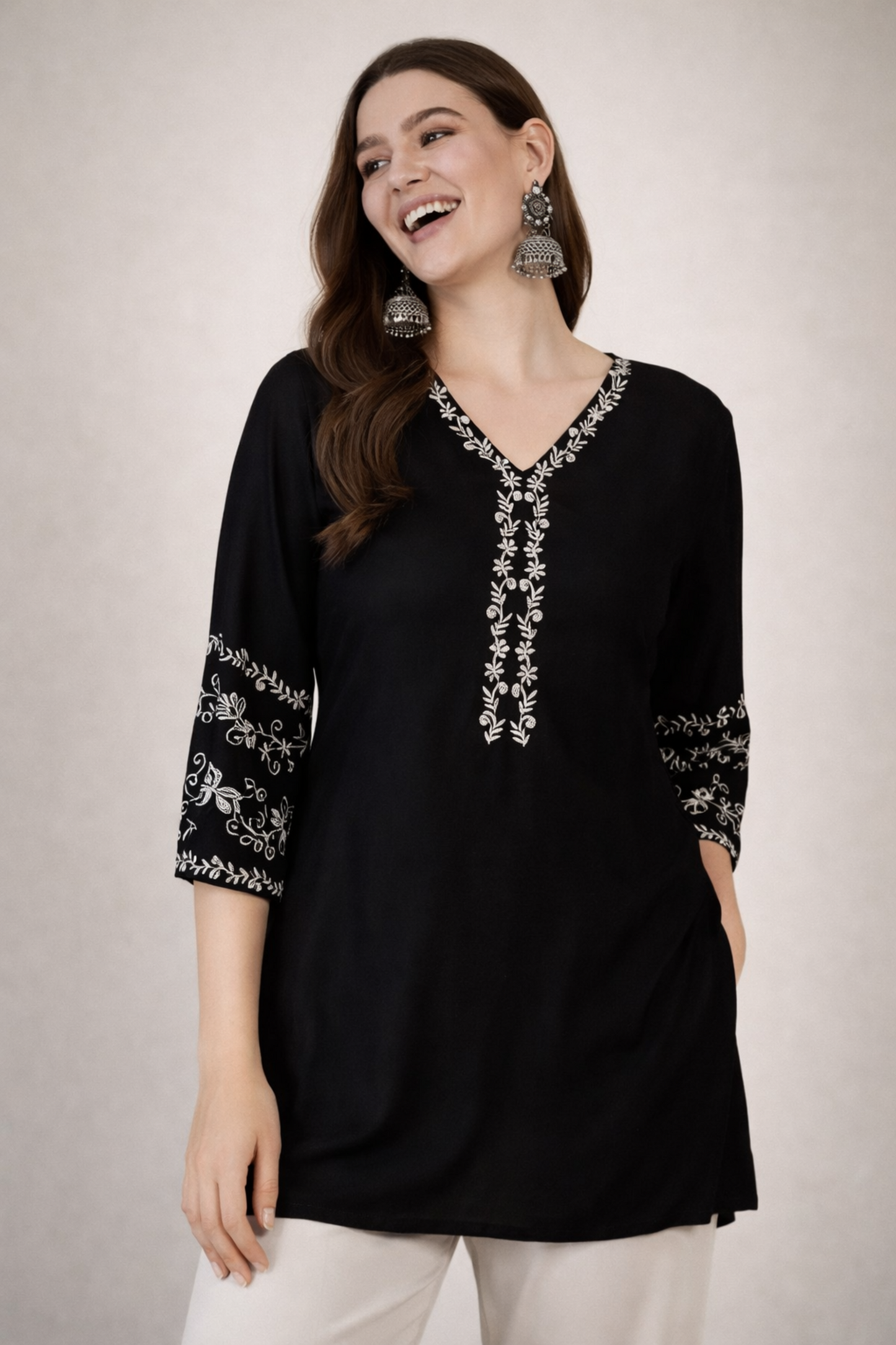 Black tops tunic front view in solid viscose rayon