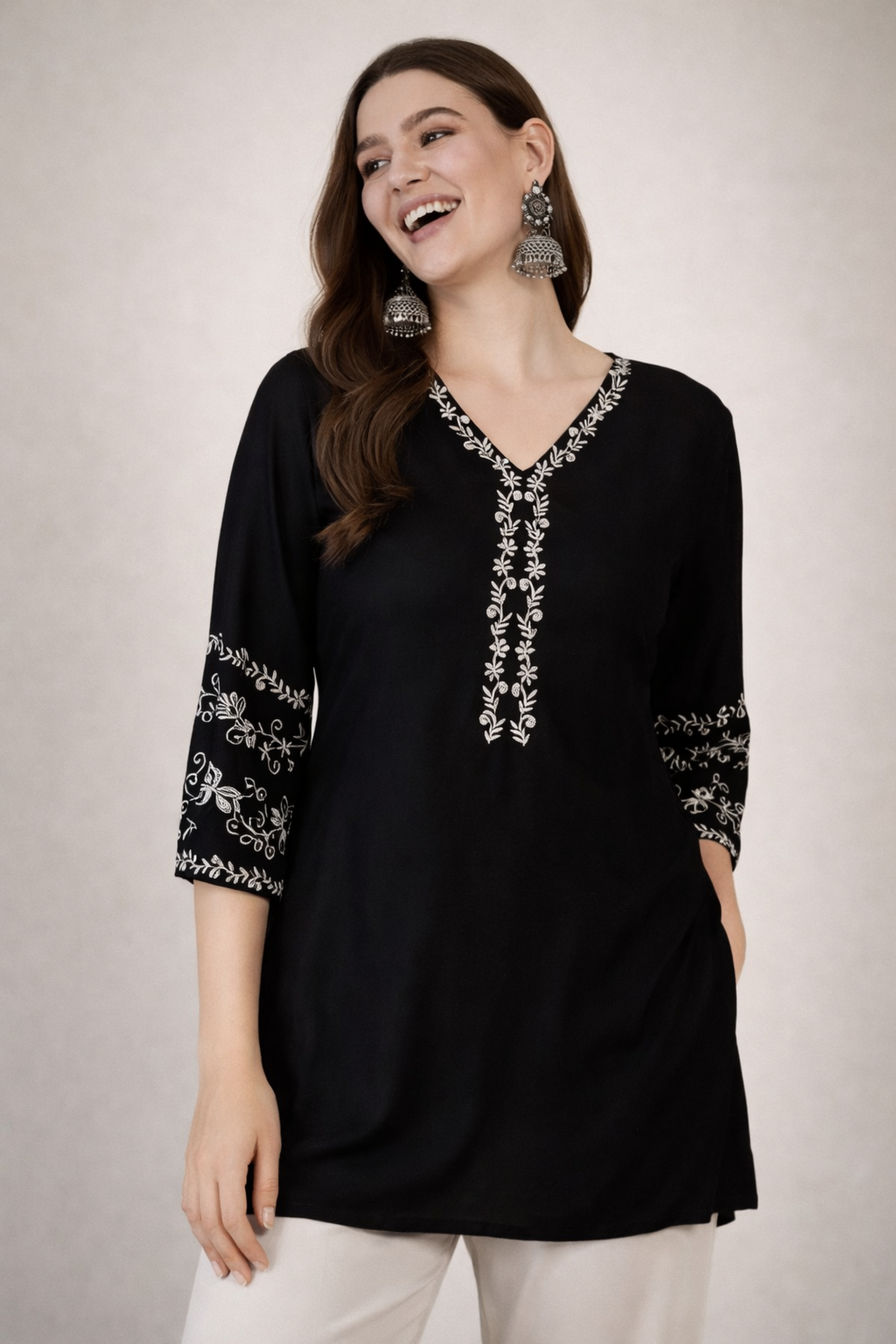 Black tops tunic front view in solid viscose rayon