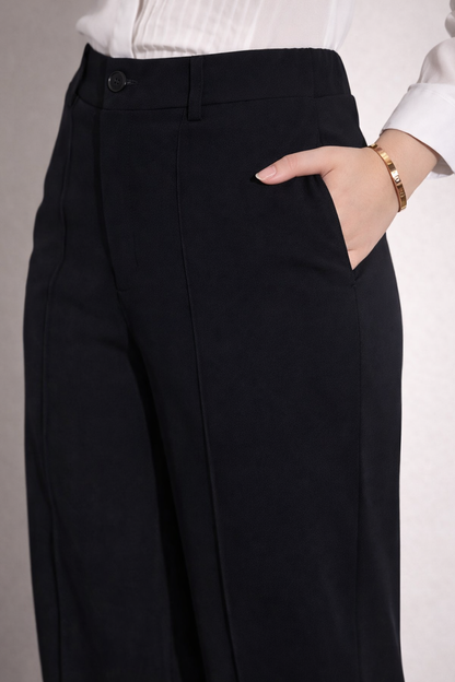 Close-up of polyester fabric texture black trousers
