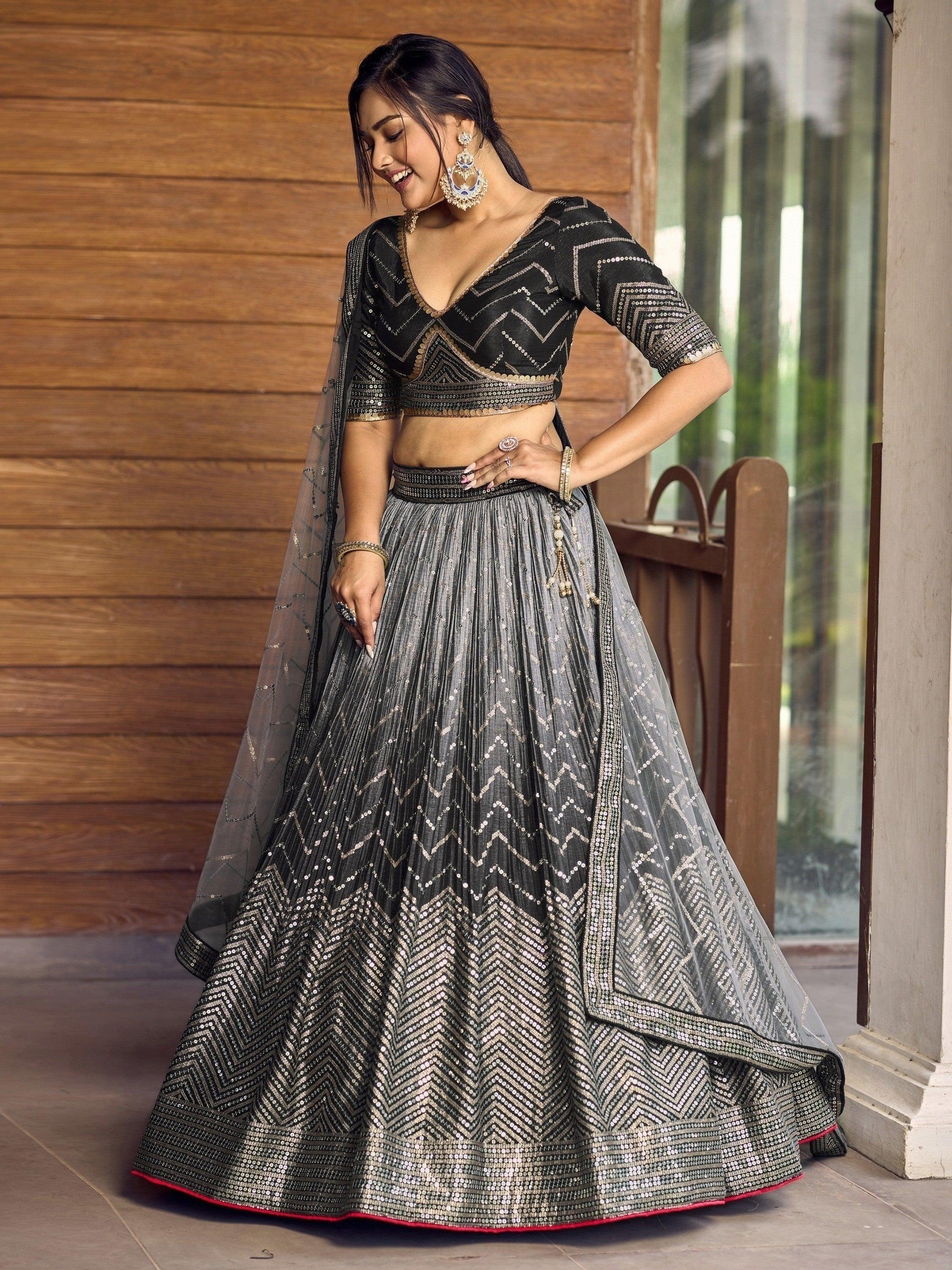 Side profile of black lehenga blouse and skirt