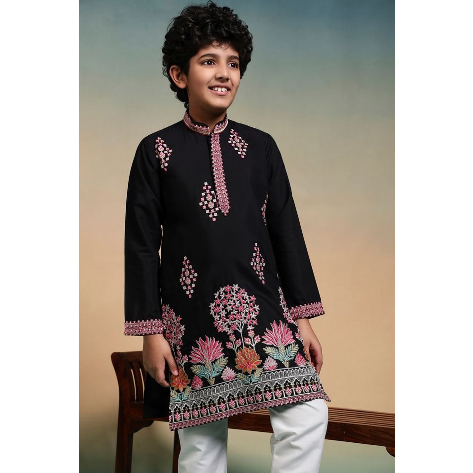 close up of multicolor thread and sequin embroidery on kurta