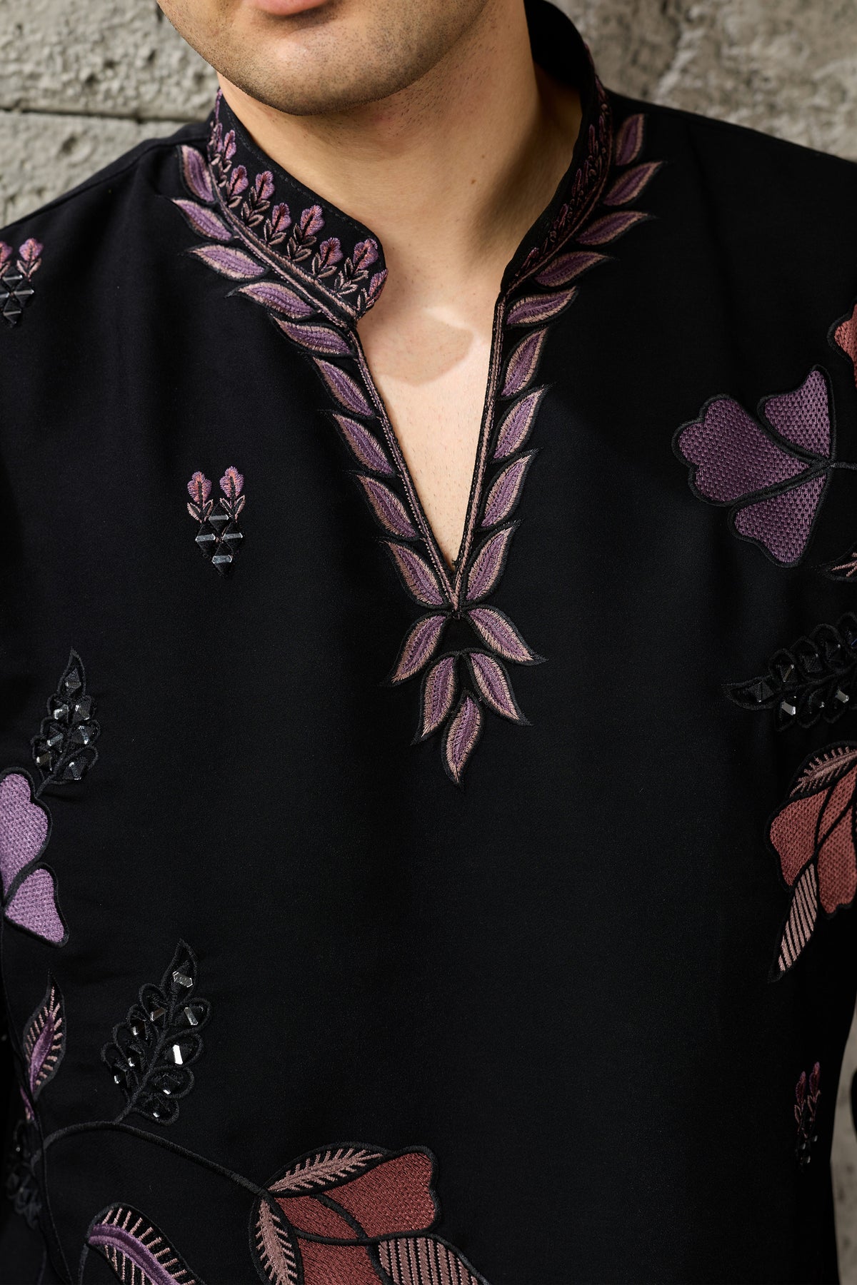 Front neckline detail of the black embroidered kurta