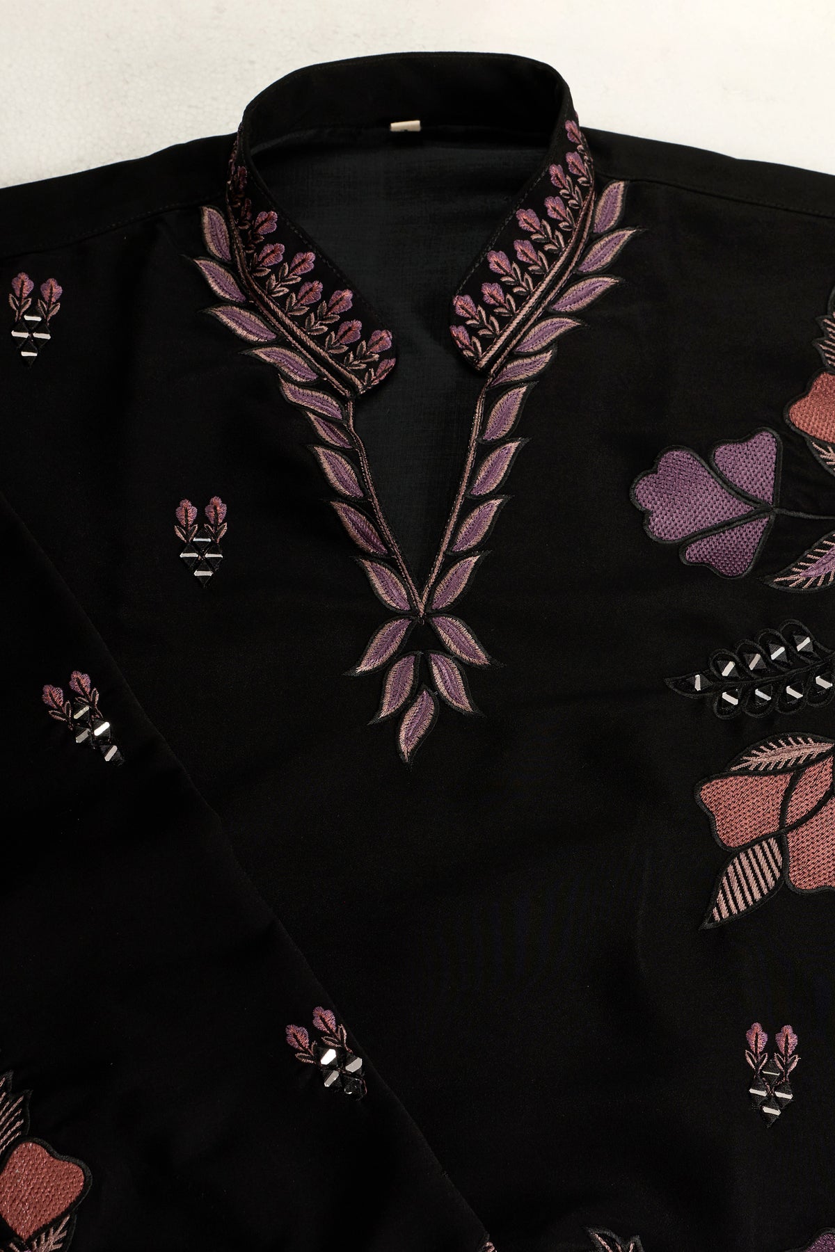 Front neckline detail of the black embroidered kurta