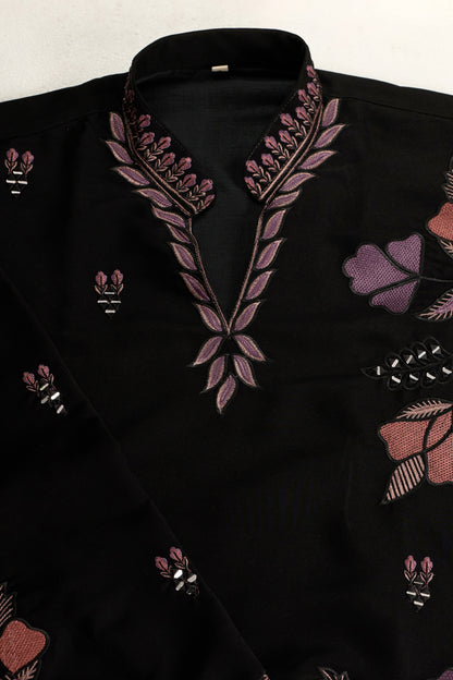 Front neckline detail of the black embroidered kurta