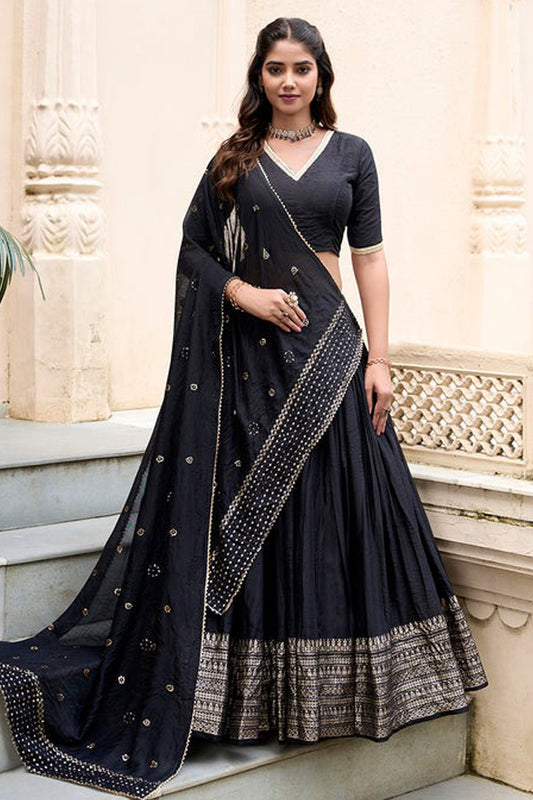Black lehenga front view with zari weaving work