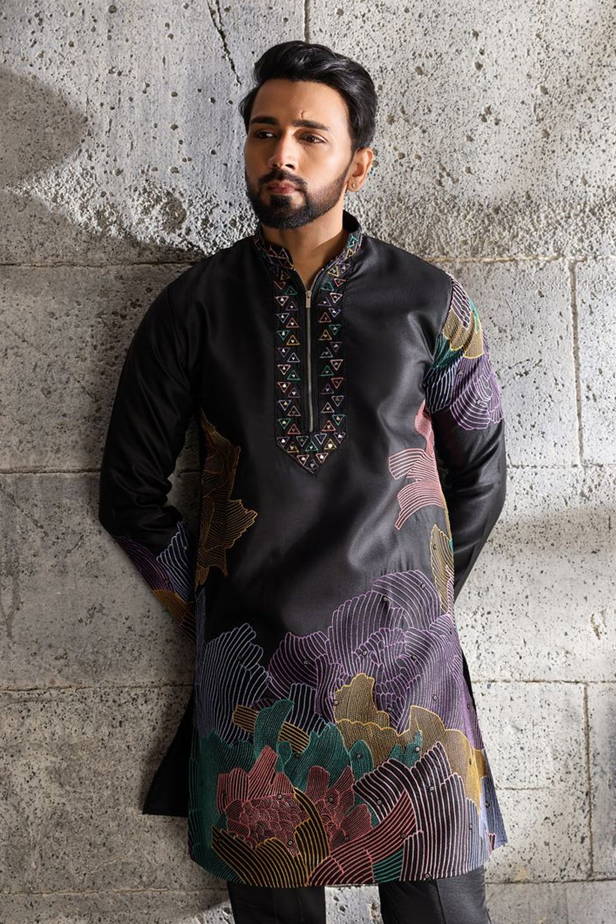 Black embroidered outfit detail