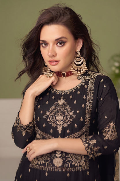 Woman wearing Black Salwar Kameez at an engagement celebration