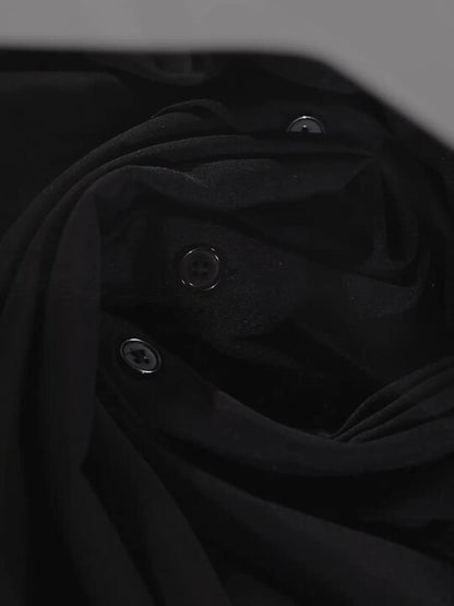 Fabric sheen detail of black polyester shirt