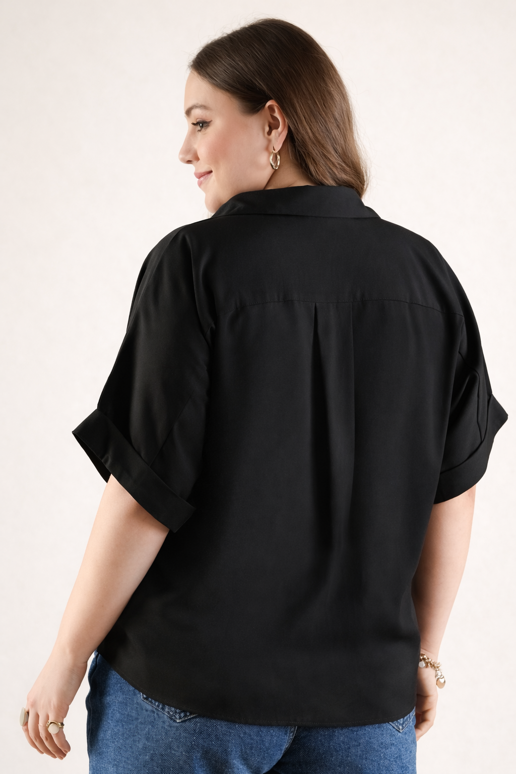 Back view of polyester black shirt with smooth finish