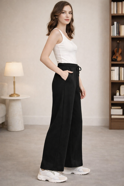 side profile of black wide leg pants silhouette