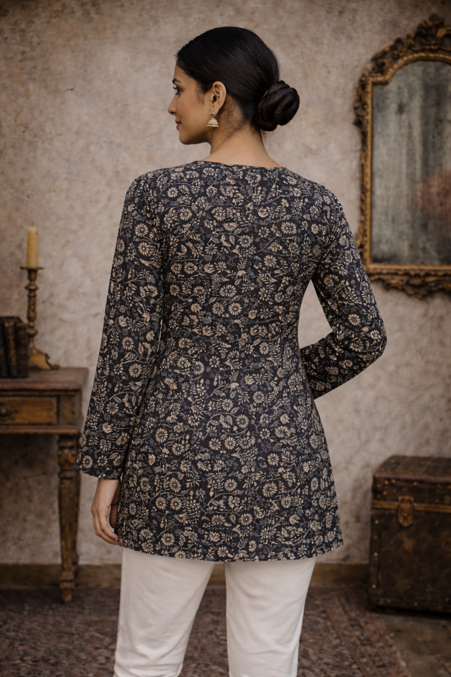 back angle of black printed tunic for weekday outfit styling