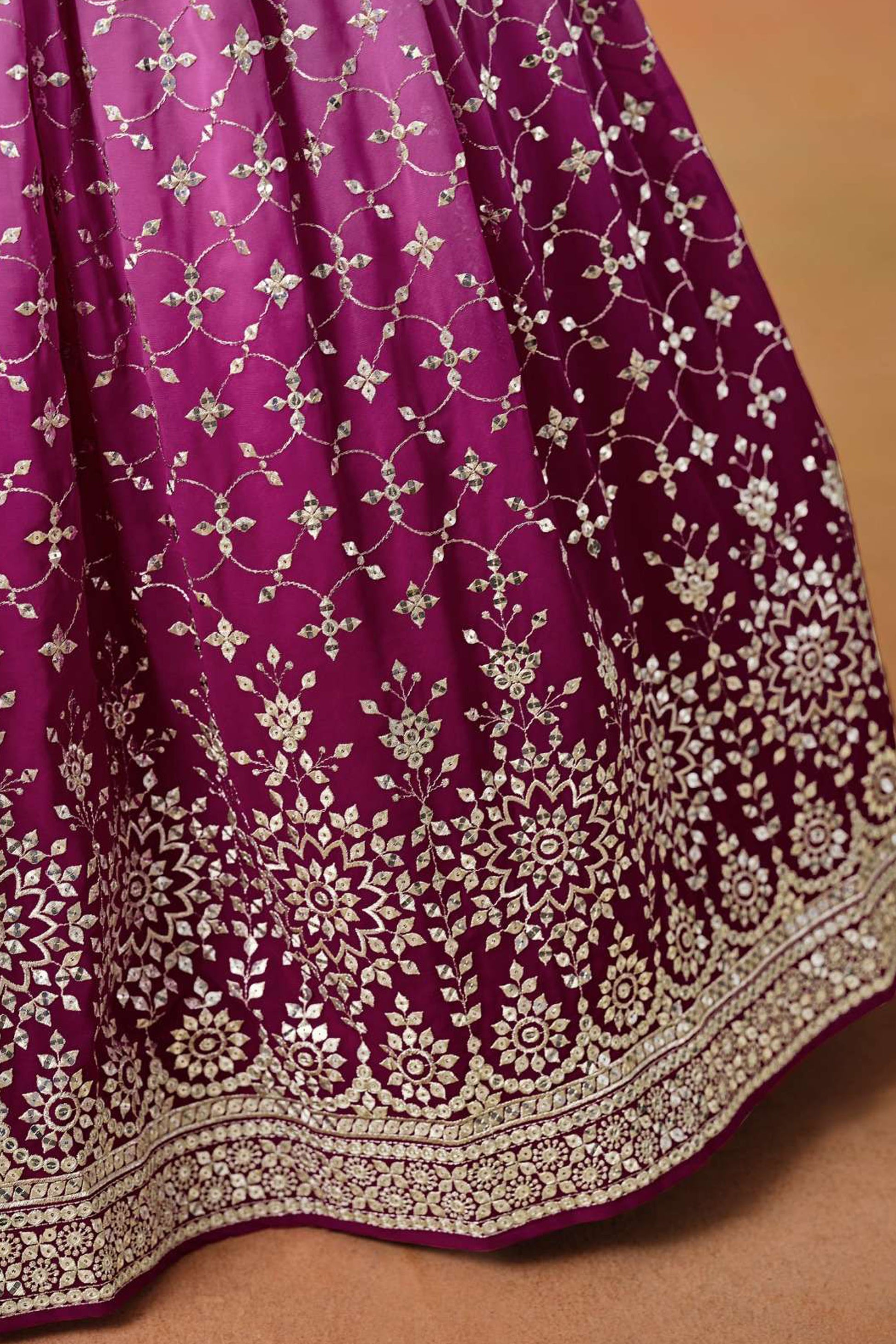 Detailed blouse design with zari embroidery finish