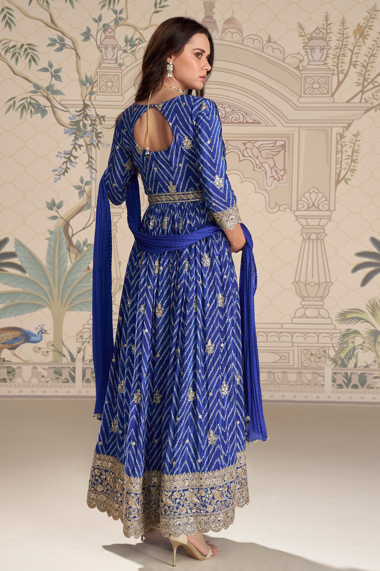 Back view of blue anarkali with detailed embroidery