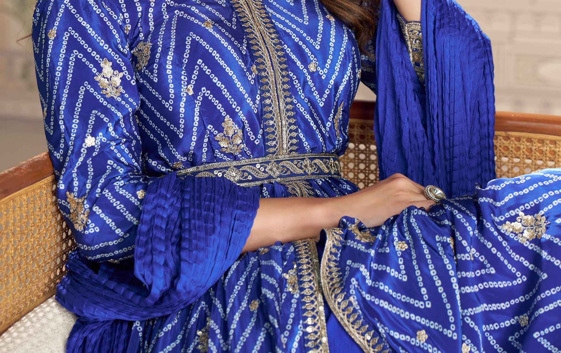 Flowing flare of blue anarkali clothes in motion